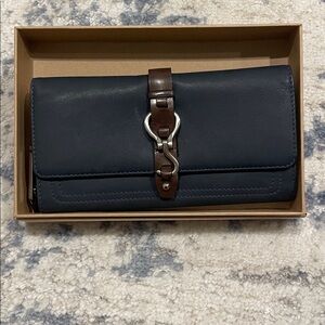 Cole Haan navy soft leather with leather brown strap Wallet